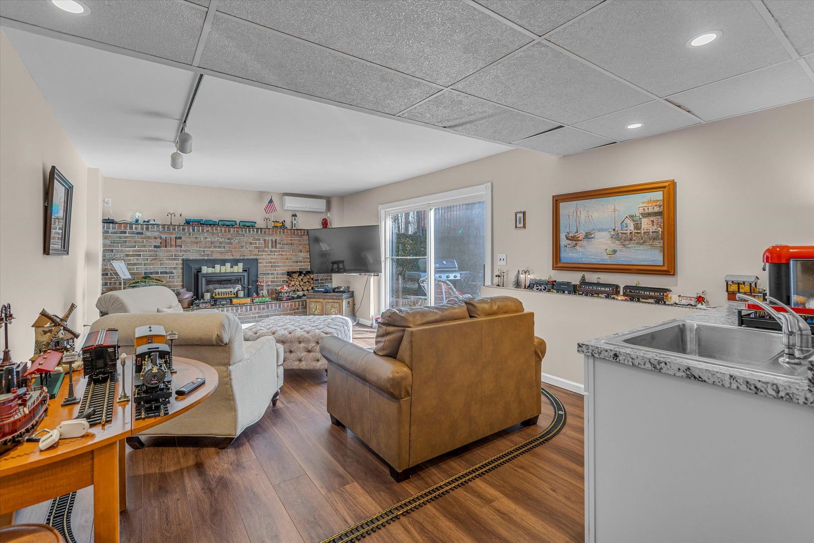  Den/family room/guest suite with sliders to garden and spa and full bath