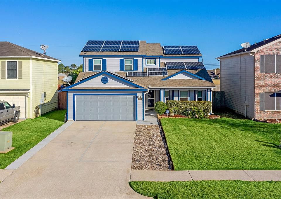 Solar Panels backed up by Tesla Battery make this home very energy efficient. Low maintenance yard.