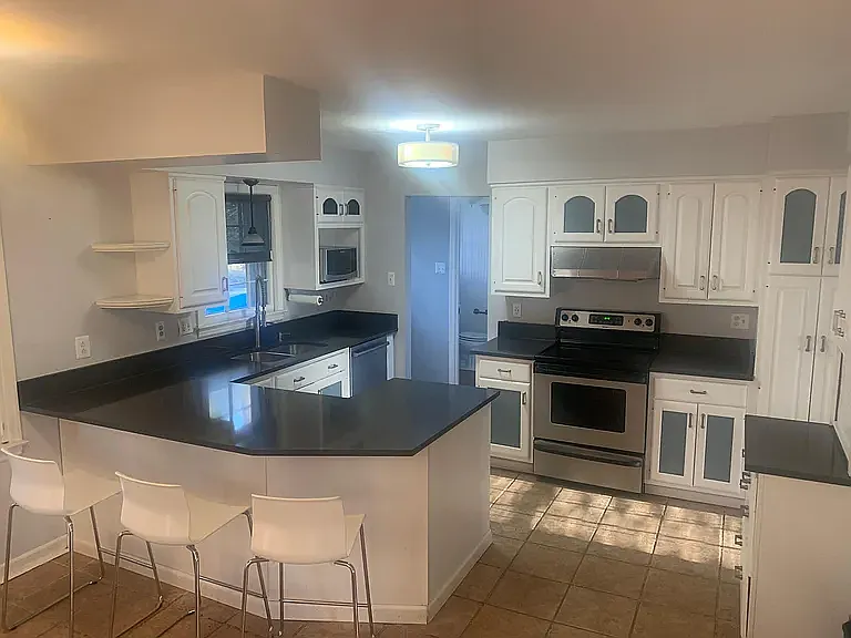8310 Chivalry Rd — Photo 6