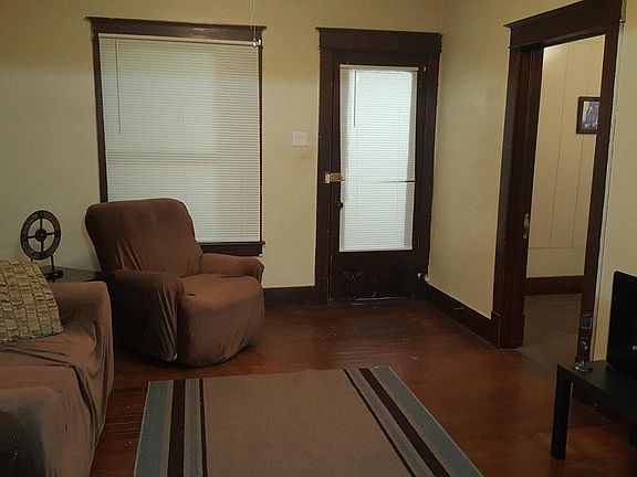 Cozy Living Room with Access to Covered Porch and Bedroom 2