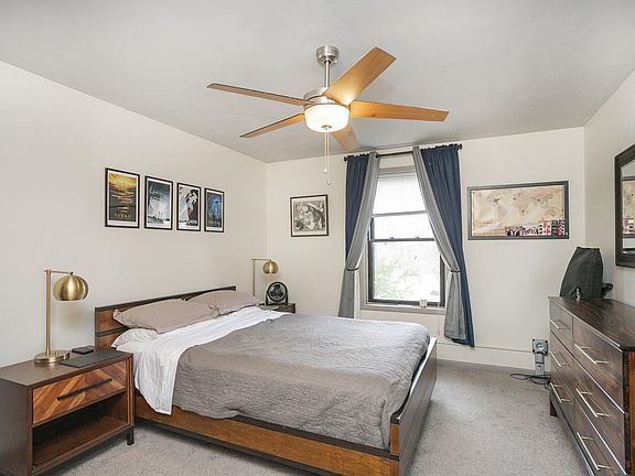 large bedroom, plenty of space for a king bed and assorted furniture.