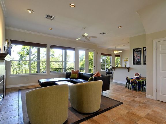 Spacious Family Room with Wall of Windows to 1st Floor Terrace