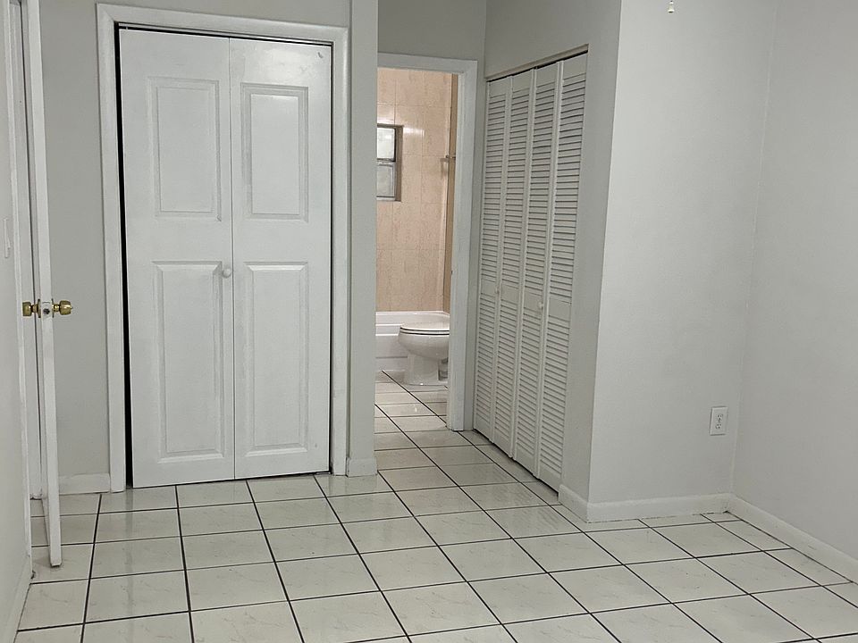 bedroom with 2 closets