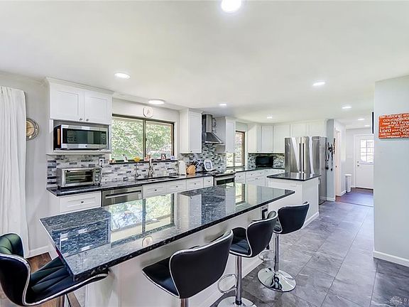 4th image of 9077 Woodstream Ln