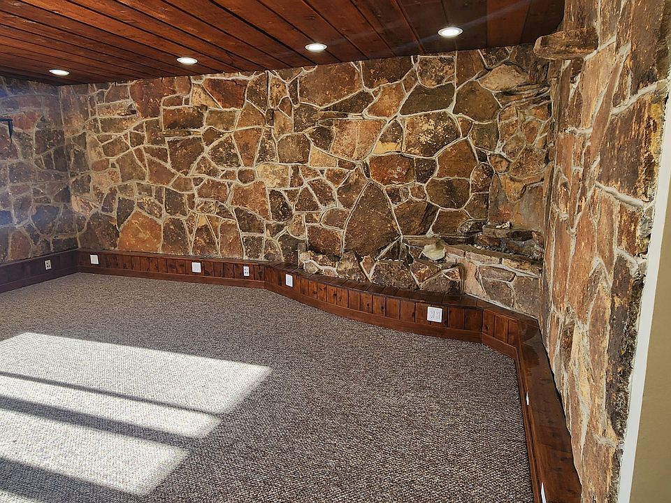 Unique stone wall living room
