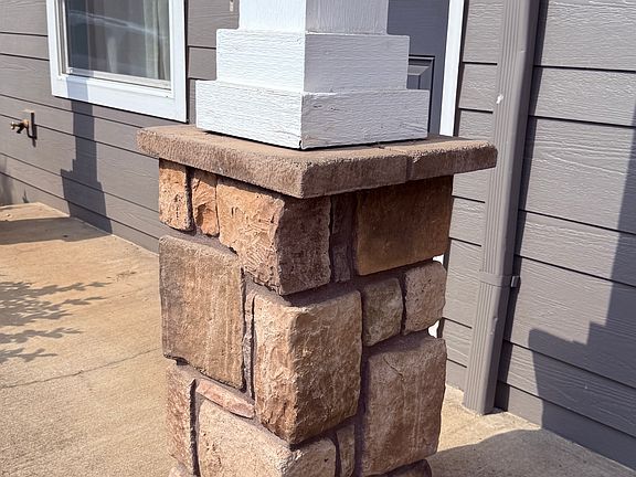 Front porch 1 step + 1 step into house