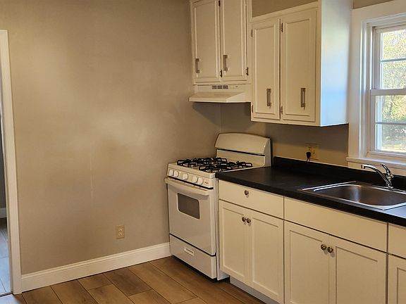 Kitchen looking into 3rd bedroom