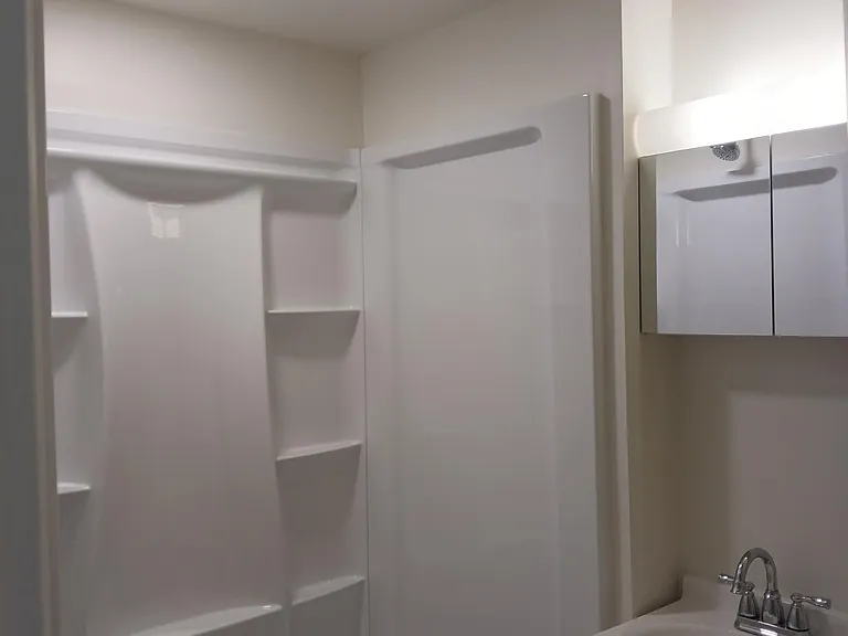 Renovated in 2025 to include new walk in shower, bathroom sink and vanity.