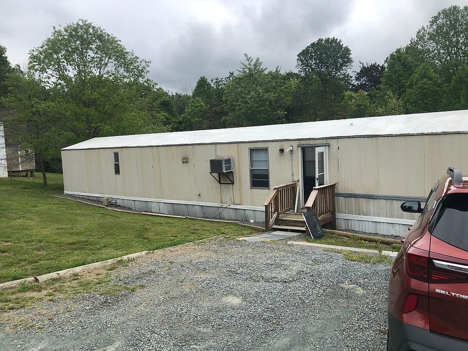 Exterior of 345 Pine Grove Court. There is a central HVAC around back, brand new.