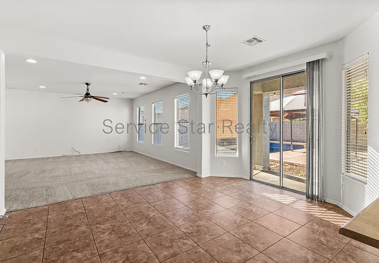 10122 W Albeniz Pl — Photo 14