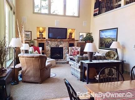 Great Room and Library Loft
						:
						Views of creek and pines with Library Loft in upper right.