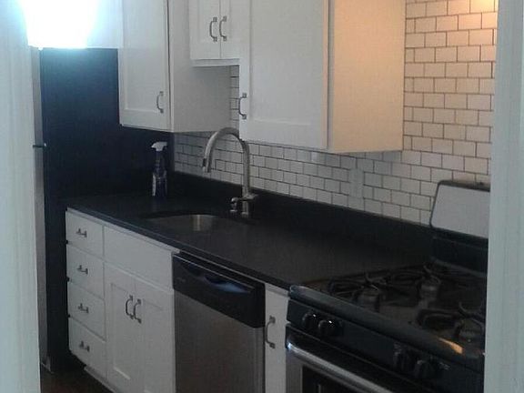 New kitchen with granite and stainless appliances