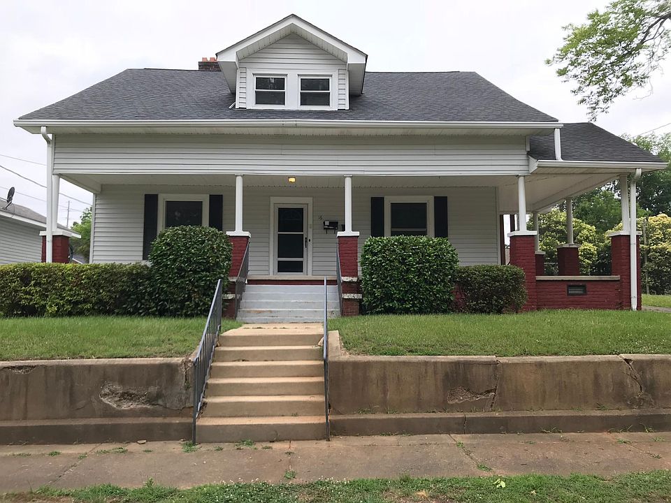 Front view, large wrap around porch