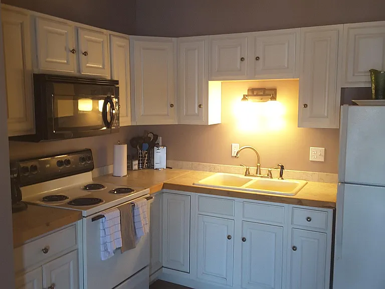 Kitchen has everything you need - pots, pans, utensils, large and small appliances.