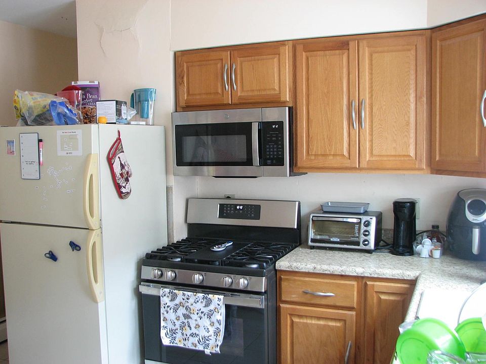 Newer microwave & gas stove. Newer cabinets. Kitchen has a southern exposure / lots of day light especially due to the 2nd floor location.