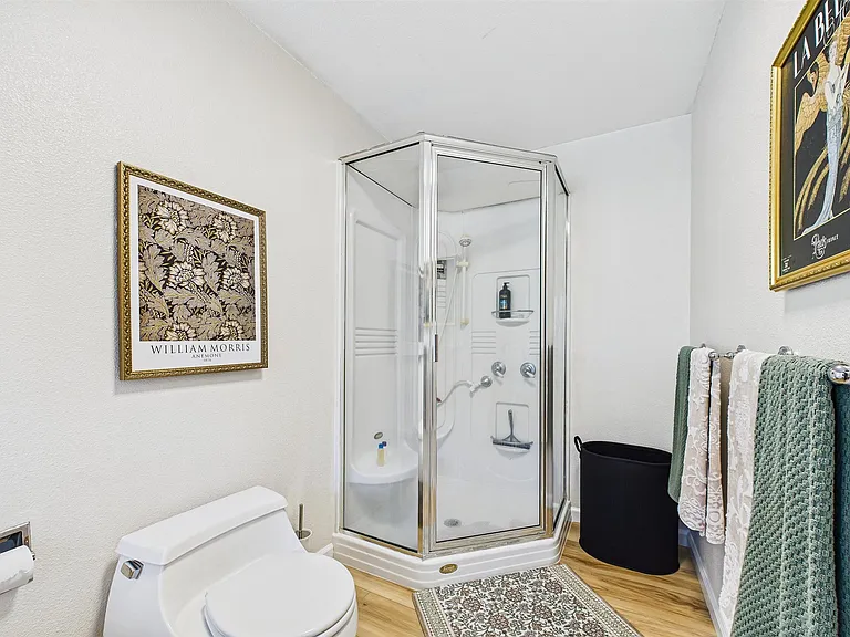 +Attached to primary bedroom
+Double sinks
+Jetted tub + stand-up shower