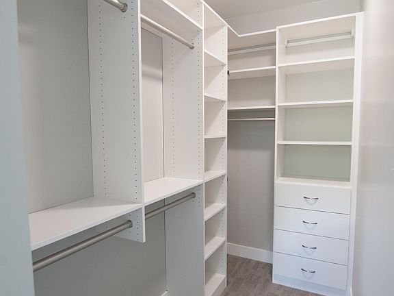 You can't beat this Incredible master bedroom walk-in closet!