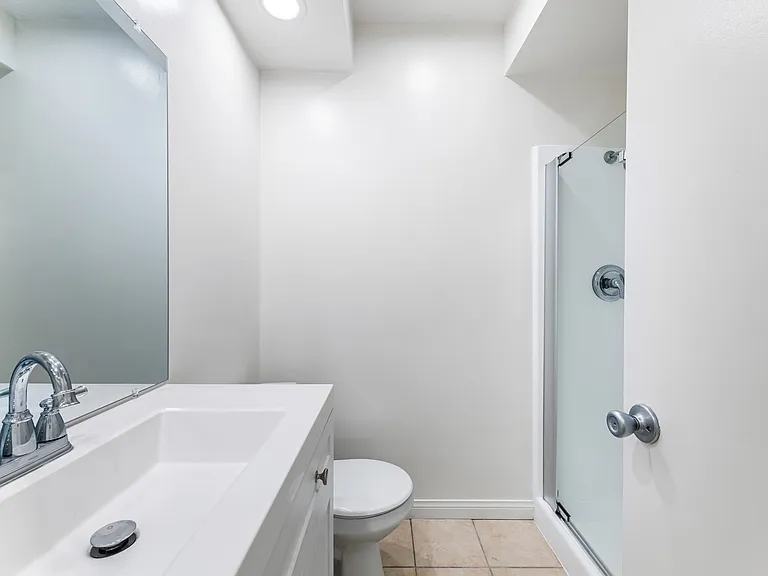 Freshly updated bath with stall shower