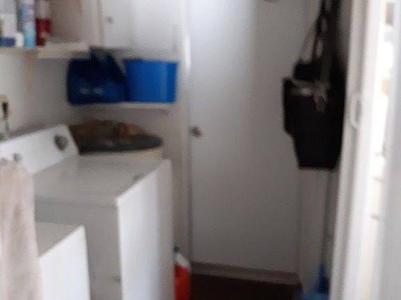 Laundry room & back exit.