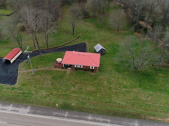 31.46 acres with home & shop