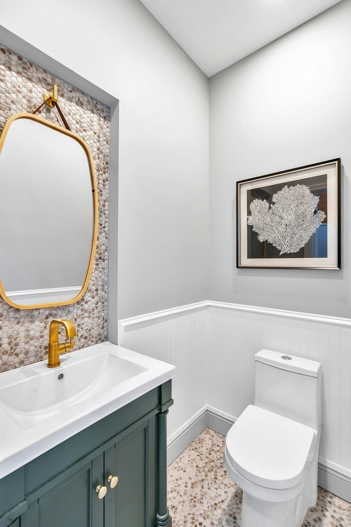  Powder Bathroom located off the kitchen on the first floor.