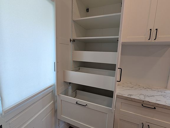 Spacious cabinet with interior drawers for extra storage!