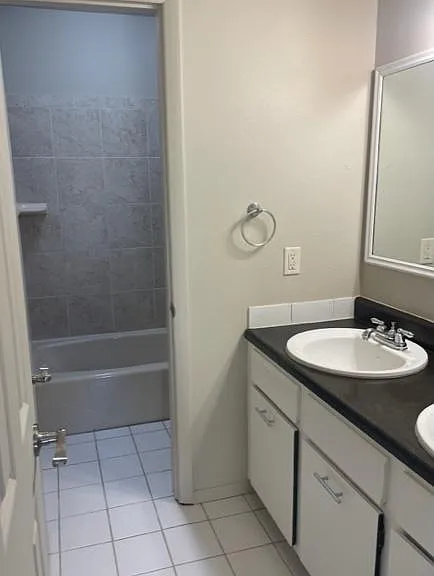 Second floor bathroom. Separate shower, tub and toilet area. Two sinks and plenty of storage. Make this a true Jack and Jill bath on this floor
