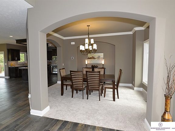 Dining room can easily be converted into an office or den.