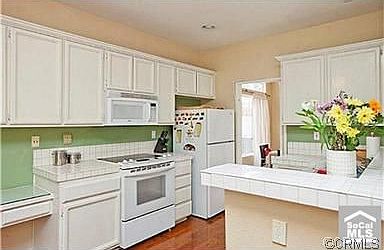 Kitchen opens to family room