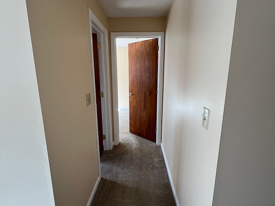 Hallway to bedroom and bathroom