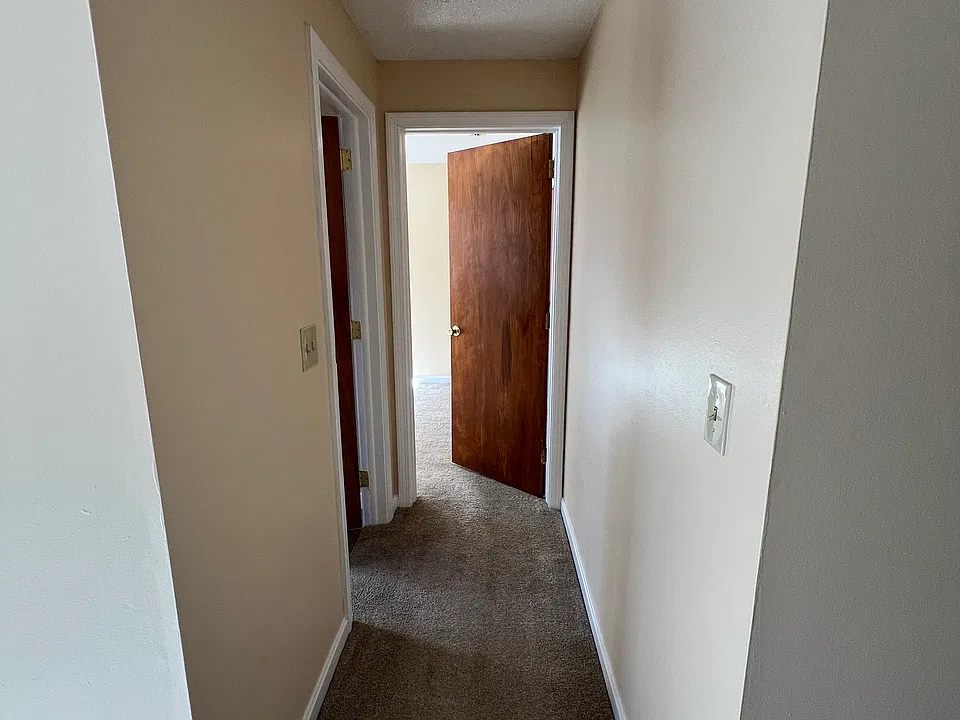 Hallway to bedroom and bathroom