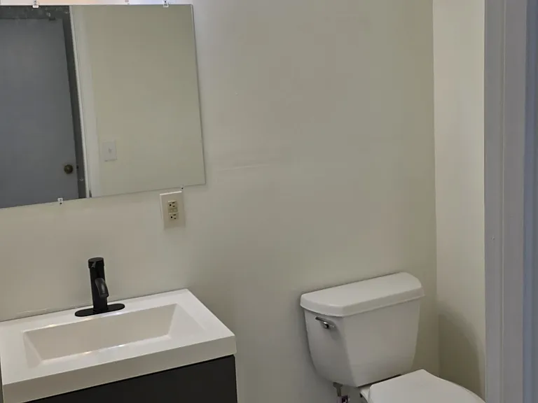 Downstairs bath with tiled floor