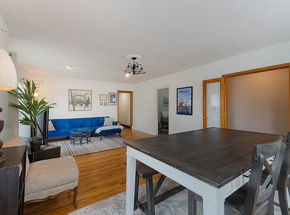 Another view of the spacious living room, with 7 windows that provide generous daylight.