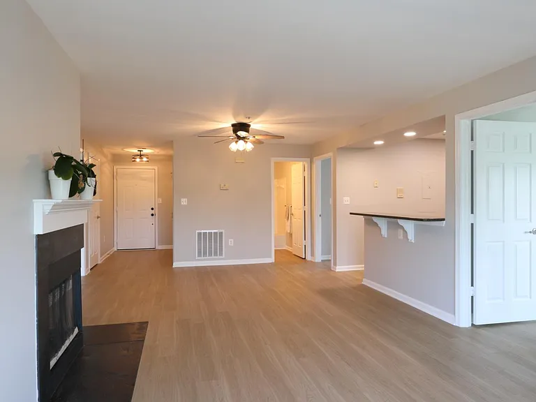Living area view of unit entry on left