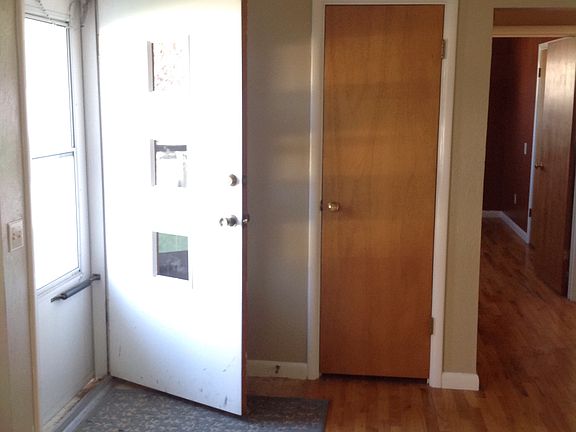 Front door and coat closet