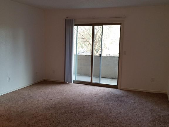 Living Room and slider to balcony.