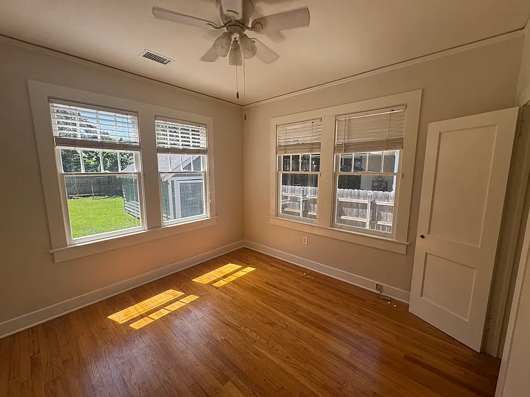 Bedroom 3 showing the windows allowing ample natural light