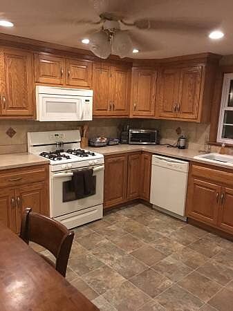 Kitchen includes dishwasher, stove/oven, fridge and microwav
