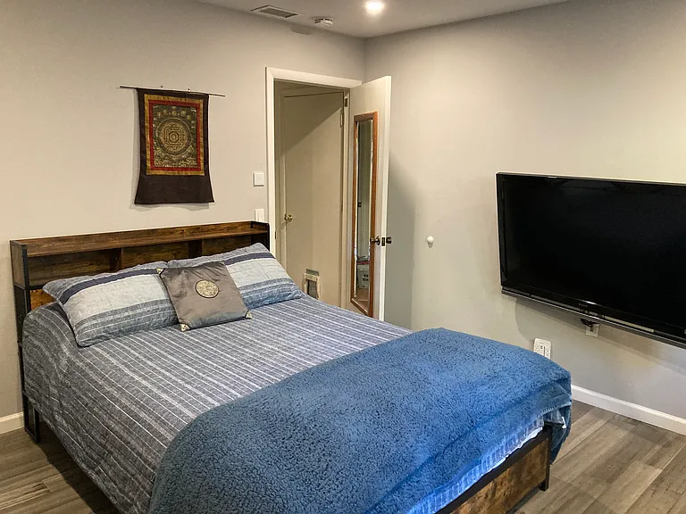 second bedroom with large screen