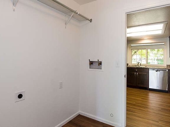 Washer & dryer hookups in unit, new hookups.