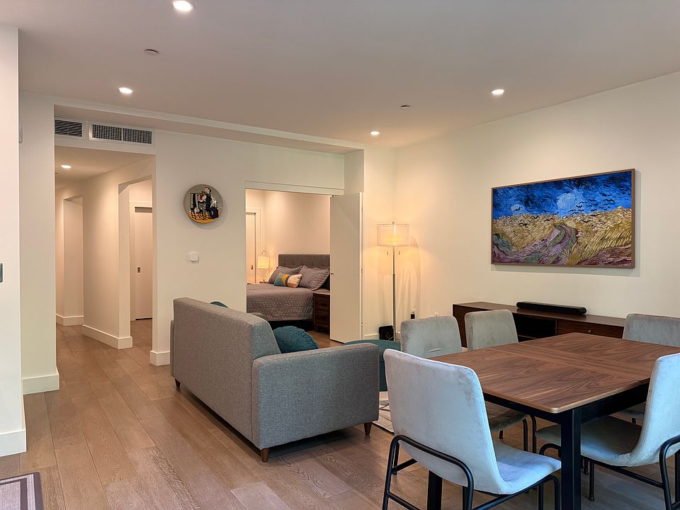 Expandable Dining Table
Samsung TV Frame acts as picture frame. External speaker for enhanced listening experience.
Console has additional drawers and storage space.