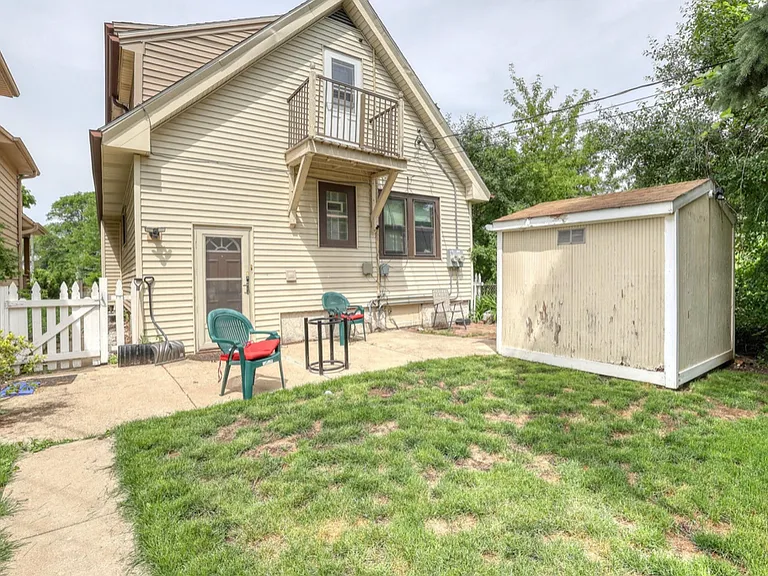 FENCED BACKYARD, BALCONY, STORAGE SHED