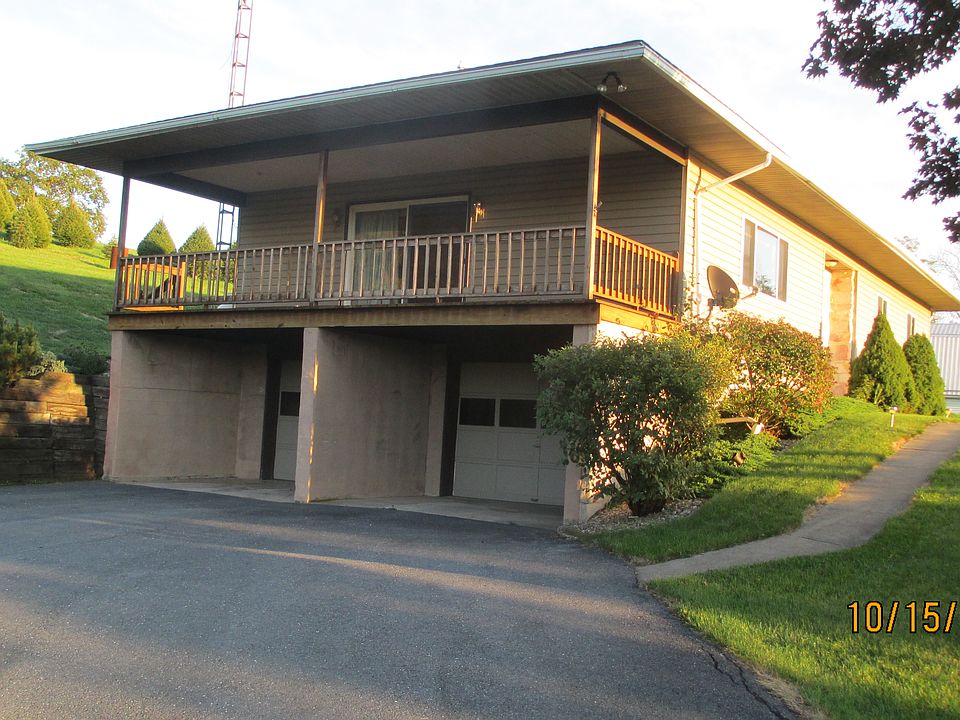 Paved drive into house