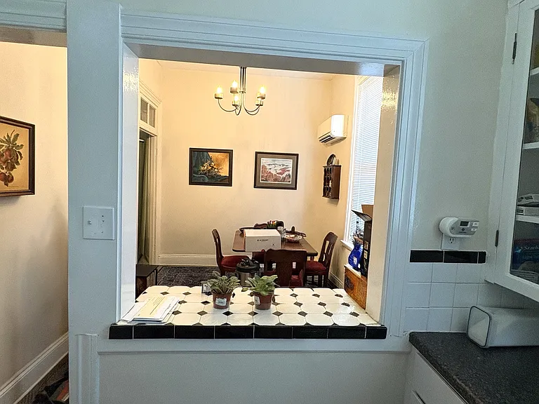 Kitchen with pass through to dining room
