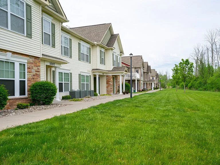 Exterior of Lehigh Park showing green areas near apartment buildings
