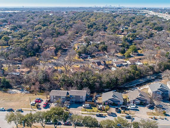 View from Park Plaza 2 residences to Little Walnut Creek and skyline of City of Austin.