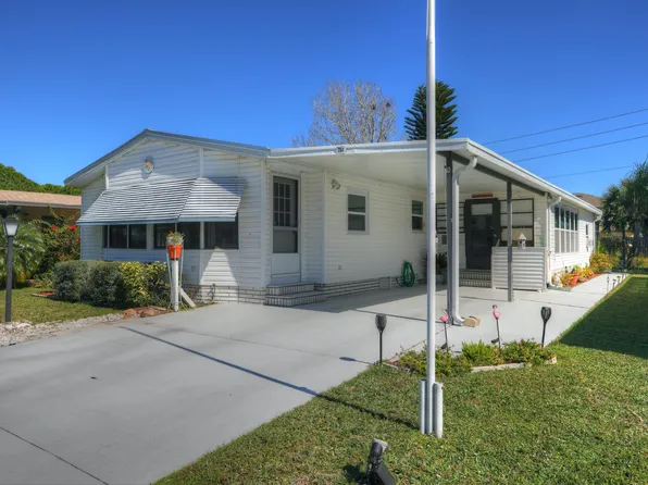 704 Gladiolus Dr, Barefoot Bay, FL 32976