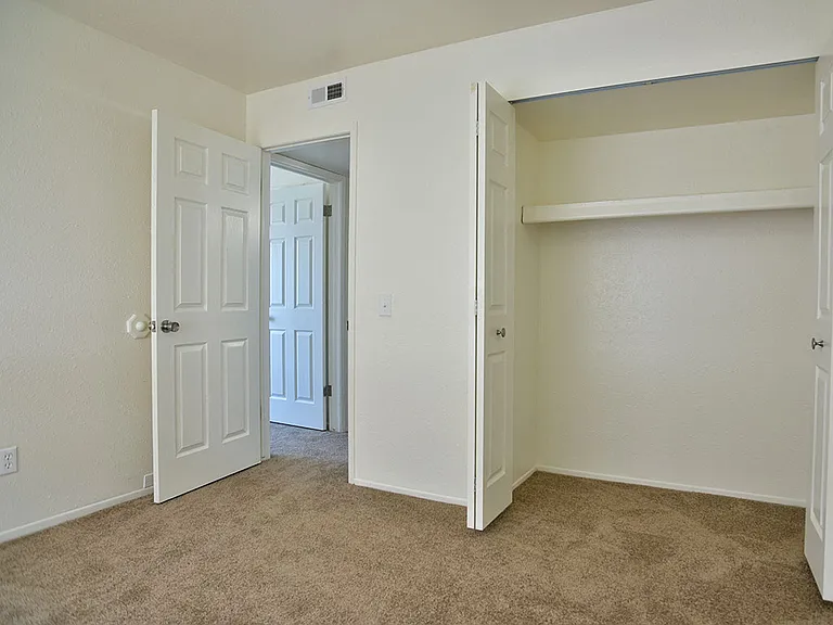 Bedroom with Carpeting