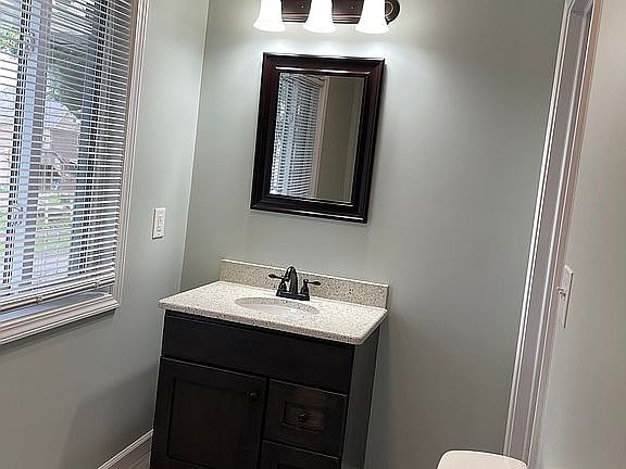 Laundry and half bathroom