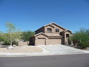 Two Story, Corner Lot, Three Car Garage
